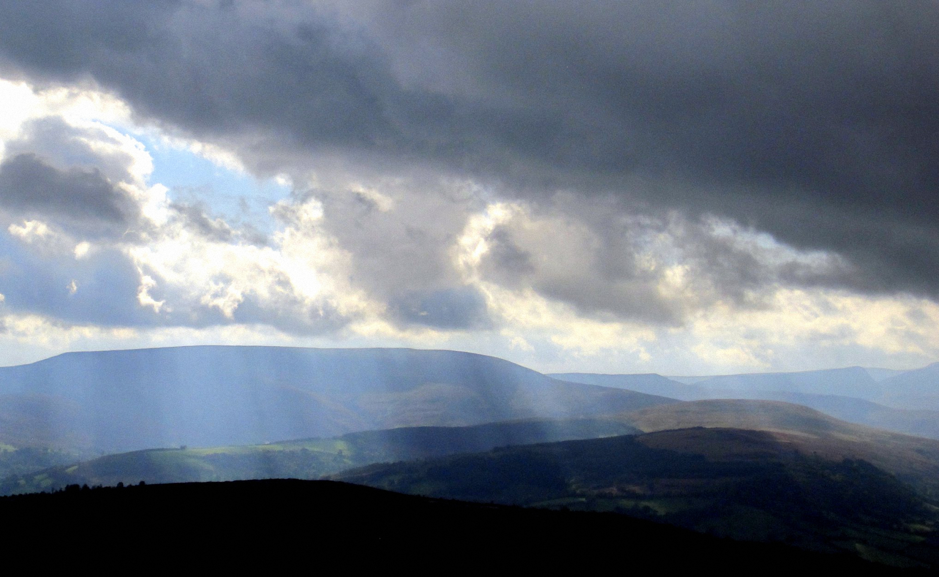 Crepusular clouds over the Brecon Beacons, Photo by Marian Parsons